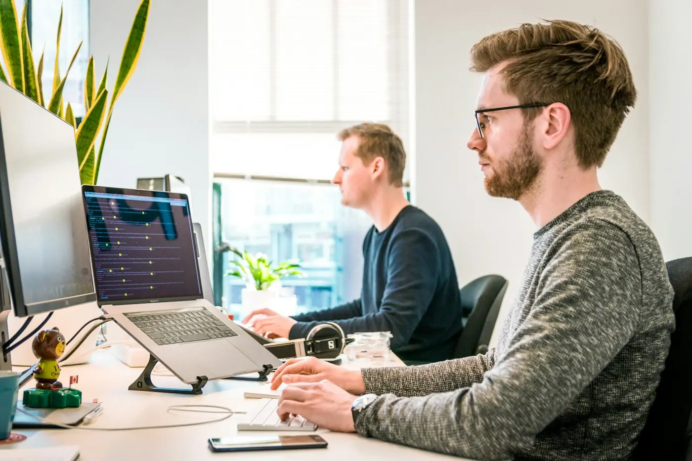 Developers at work in an open-plan office